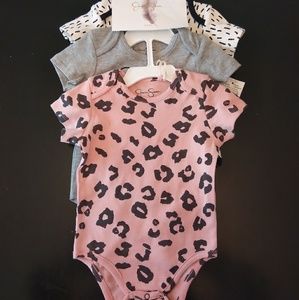 Baby girl onesies Brand new with tags. Set of thre
